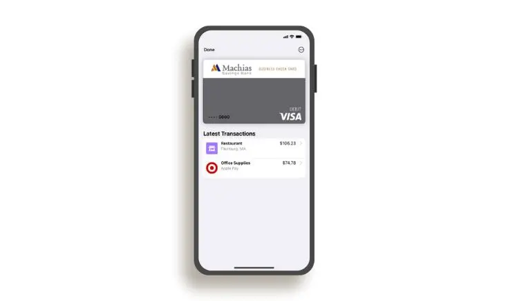 Phone with a mobile wallet screen pulled up, with a Machias Bank card selected