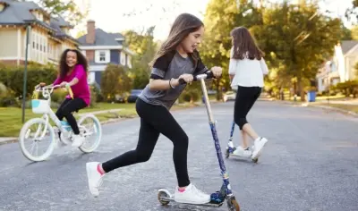 Kids riding scooters