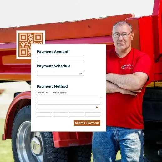 Man standing next to a red truck with a QR code.